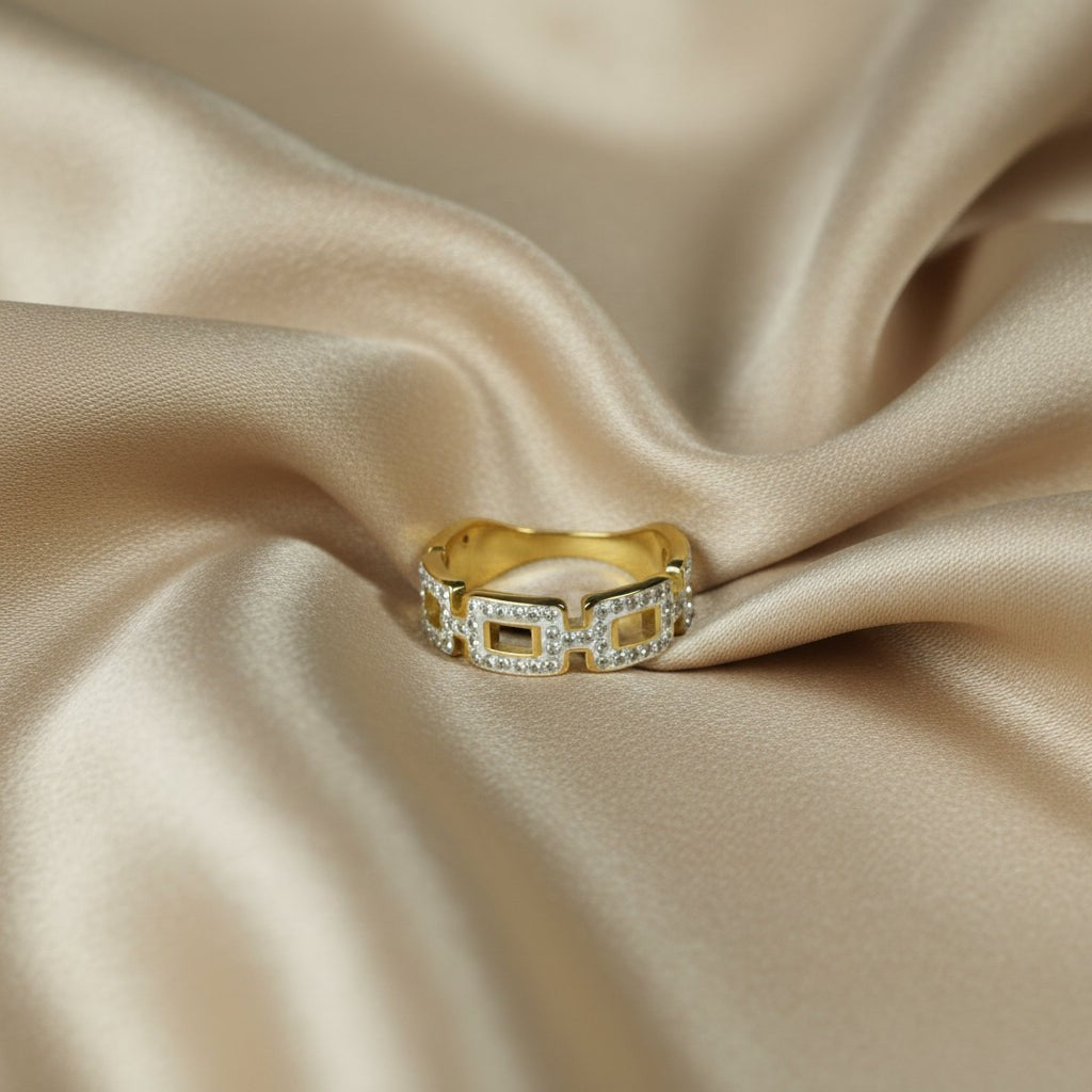 SVORA gold chain link ring with clear stones on rectangular links, made of 18K gold plated stainless steel.