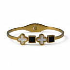 SVORA gold-plated stainless steel bracelet with white mother-of-pearl clover and black onyx square motifs.