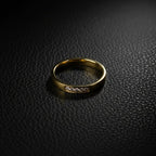 SVORA gold five stone ring with channel-set diamonds on a slim band, made of 18K gold plated stainless steel.