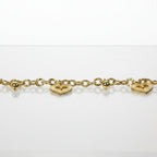 SVORA gold cable chain bracelet with three heart charms and gold beads. 18K gold plated, stainless steel.