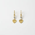 SVORA gold tone stainless steel dangle earrings with cubic zirconia and textured heart charms.