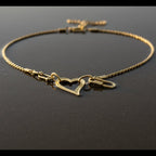 SVORA gold-tone stainless steel open heart statement necklace with toggle clasp. Waterproof and anti-tarnish.