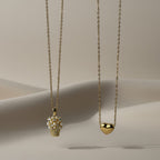 SVORA gold puffy heart pendant necklace made of stainless steel with 18k gold plating.