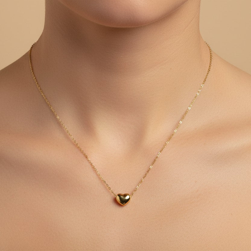 SVORA gold puffy heart pendant necklace made of 18k gold-plated stainless steel.