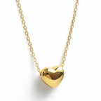 SVORA gold puffy heart pendant necklace made of stainless steel with 18k gold plating.