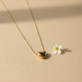SVORA gold puffy heart pendant necklace made of stainless steel with 18k gold plating.