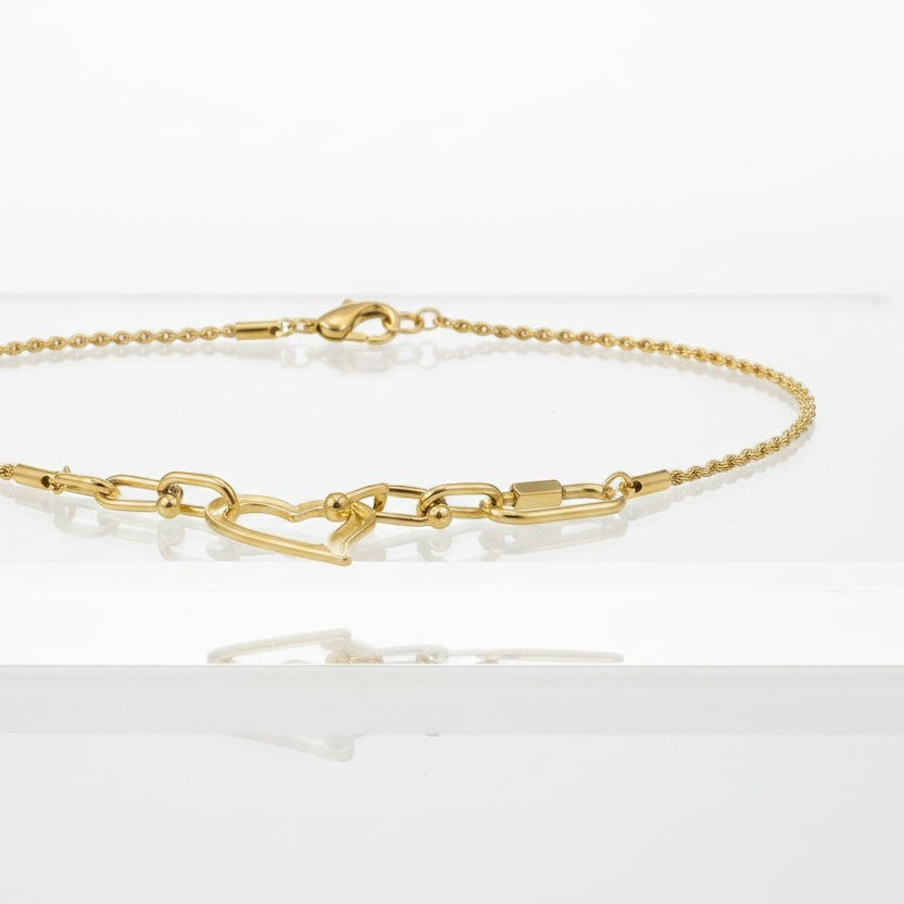 SVORA gold-tone stainless steel open heart rope statement necklace with toggle clasp. Waterproof and anti-tarnish.