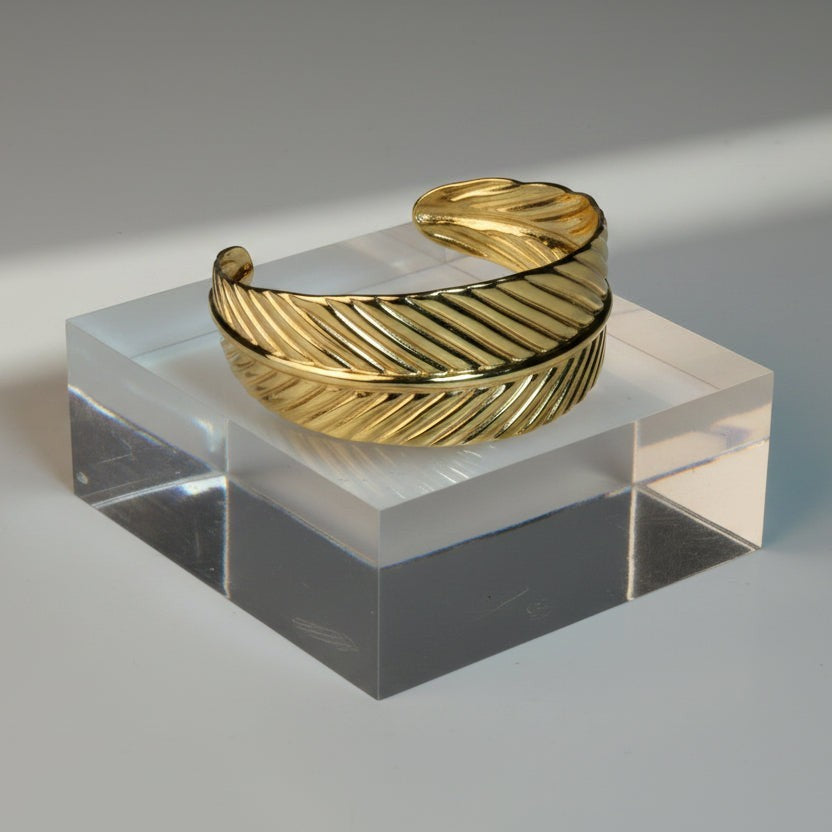 SVORA gold palm leaf cuff bracelet with detailed veins, 18K gold plated stainless steel, adjustable.