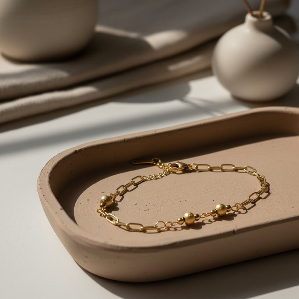 SVORA gold paperclip chain bracelet with three gold ball beads, 18K gold plated stainless steel, adjustable lobster clasp.