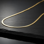 SVORA gold snake chain necklace, 18K gold plated stainless steel, smooth and flexible herringbone design.