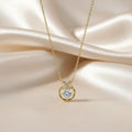 SVORA gold plated stainless steel pendant necklace with solitaire CZ and pavé butterfly detail.