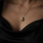 SVORA gold plated stainless steel pendant necklace with a solitaire CZ and pavé butterfly detail.