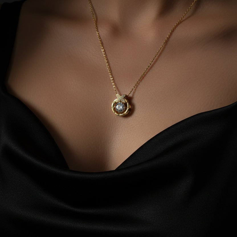 SVORA gold plated stainless steel pendant necklace with a solitaire CZ and pavé butterfly detail.