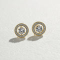 SVORA gold tone stainless steel stud earrings with round cubic zirconia center and pavé halo.