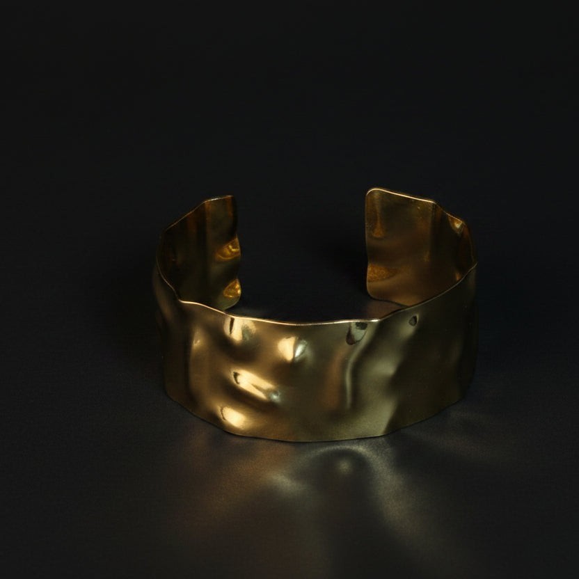 SVORA wide gold cuff bracelet with hammered texture, 18K gold plated stainless steel, adjustable.