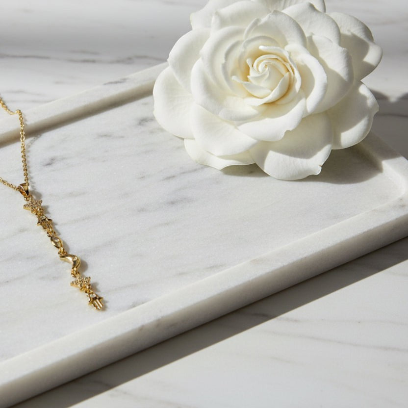 SVORA gold plated stainless steel Hamsa Talisman Charm Necklace with star and moon charms.