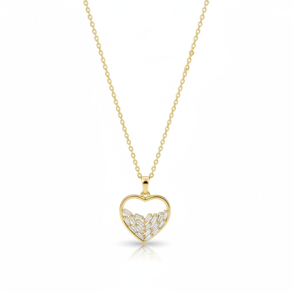 SVORA gold plated stainless steel necklace with a heart pendant featuring baguette-cut cubic zirconia.