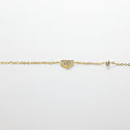SVORA gold plated stainless steel bracelet with a CZ-pavé heart charm and a round stone accent.