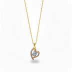 SVORA gold-plated stainless steel necklace with a heart-shaped pendant adorned with clear crystals.