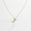 SVORA gold plated stainless steel necklace with a clear heart-cut cubic zirconia solitaire pendant.