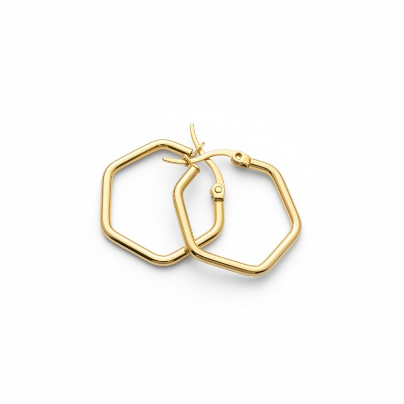 SVORA gold-tone stainless steel hexagon hoop earrings with a polished finish.