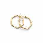 SVORA gold-tone stainless steel hexagon hoop earrings with a polished finish.