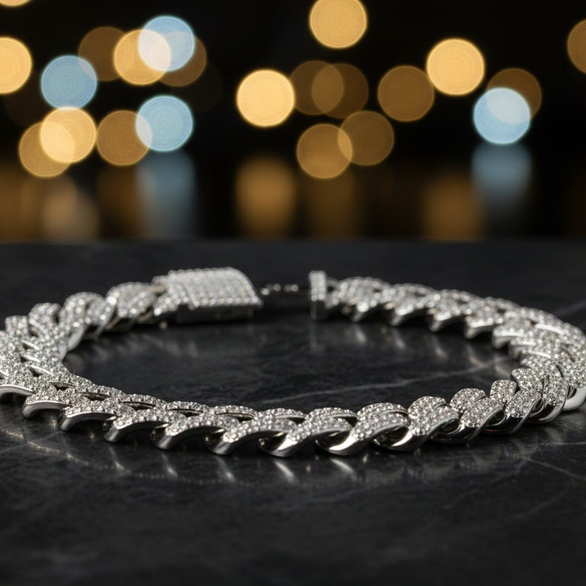 SVORA iced Cuban link bracelet with white CZ stones, silver-tone stainless steel, secure box clasp.