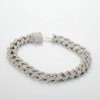 SVORA iced Cuban link bracelet in silver with white CZ stones and a secure box clasp. Made from 316L stainless steel.