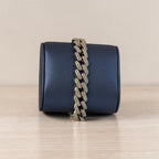 SVORA iced Cuban link bracelet with white CZ stones, rhodium-plated stainless steel, secure box clasp.