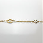 SVORA gold layered chain bracelet with hollow circle and clover charms. 18K gold plated stainless steel.