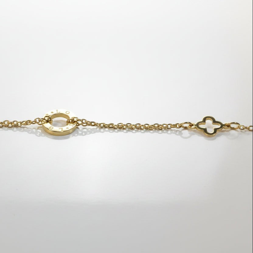 SVORA gold layered chain bracelet with hollow circle and clover charms. 18K gold plated stainless steel.