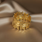 SVORA gold plated stainless steel Lotus Open Cuff Bracelet with floral petal design. Adjustable and hypoallergenic.