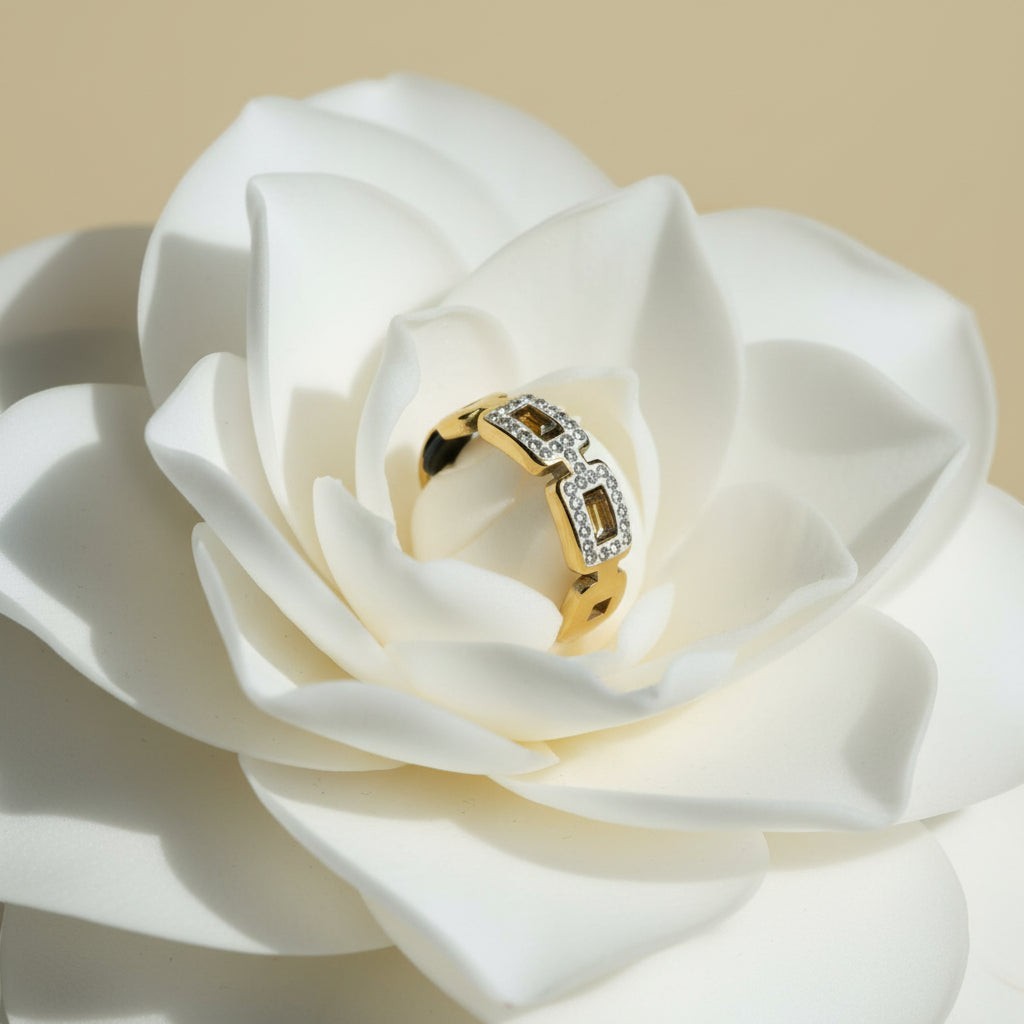 SVORA Lumiere Belt Link Ring in gold, featuring three open rectangular links outlined in small stones. Waterproof and hypoallergenic.