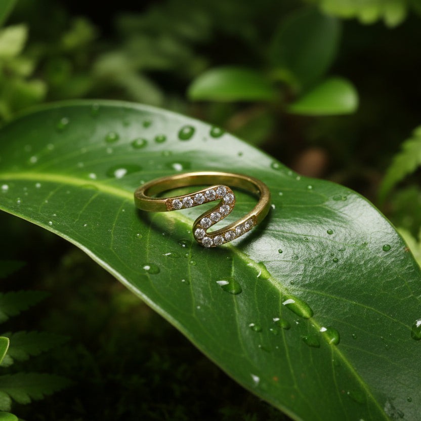 SVORA gold plated stainless steel Lumiere Chevron Slim Ring with small stones in a zigzag pattern.