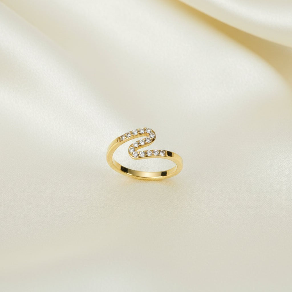 SVORA gold plated stainless steel Lumiere Chevron Slim Ring with small stones in a zigzag pattern.