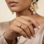 SVORA gold chevron slim ring with small stones, designed for stacking. 18K gold plated stainless steel.