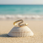 SVORA Lumiere Chevron Slim Ring in gold, featuring a zigzag line of small stones. Made of 18K gold-plated stainless steel.