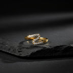 SVORA Lumiere Chevron Slim Ring in gold-plated stainless steel with a zigzag line of small stones.