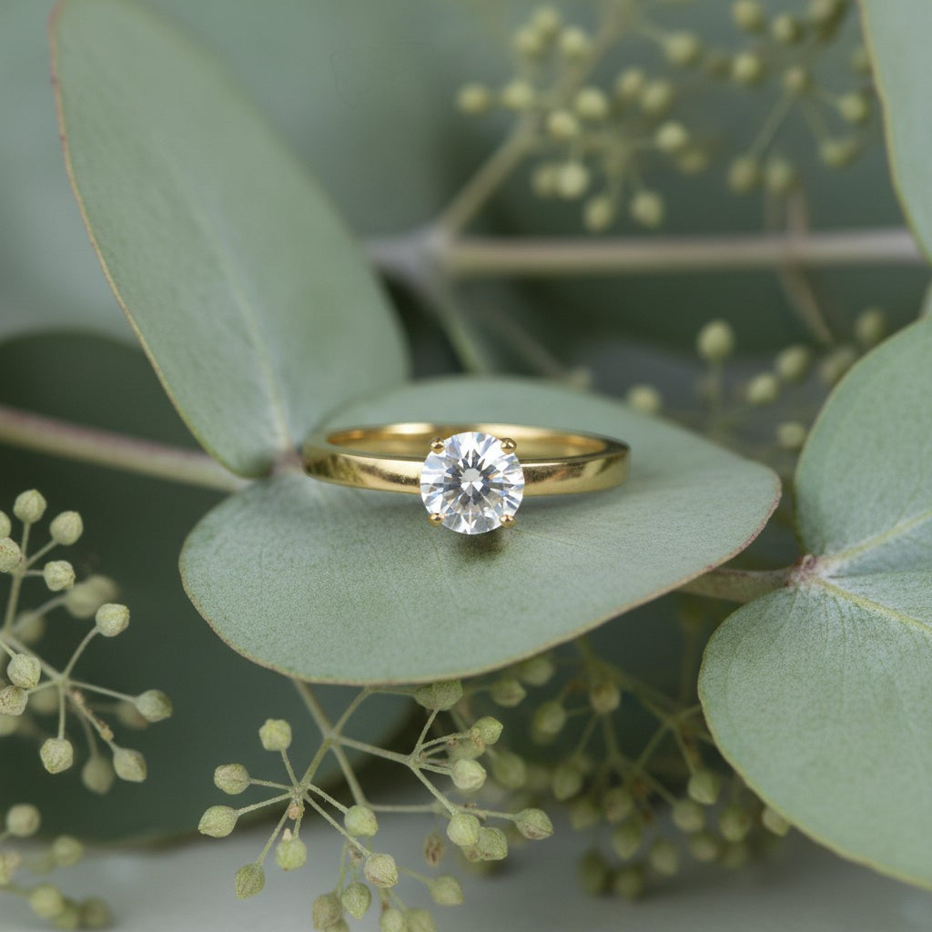 SVORA Lumiere Princess Solitaire Ring in gold-plated stainless steel with a princess-cut center stone.