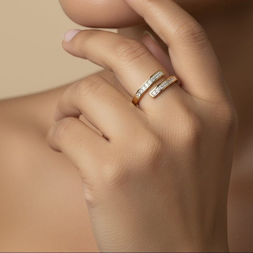 SVORA Lumiere Twin Spark Ring in gold tone 18K gold plated stainless steel with crystal white cubic zirconia.