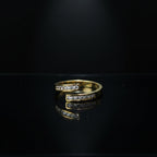 SVORA Lumiere Twin Spark Ring in gold tone, 18K gold plated stainless steel with crystal white cubic zirconia. Wrap design.