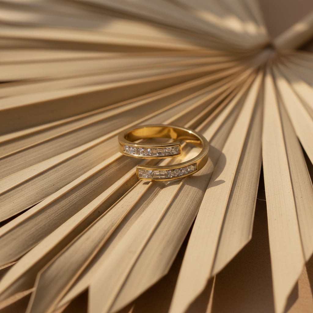 SVORA Lumiere Twin Spark Ring, gold-tone stainless steel with crystal white cubic zirconia accents, wrap design.