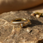 SVORA gold plated stainless steel Lumiere Twist Wrap Ring with pavé-set band and rounded head.