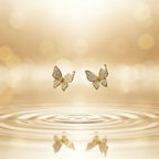 SVORA mini gold butterfly stud earrings with cubic zirconia stones, 18K gold tone plating.