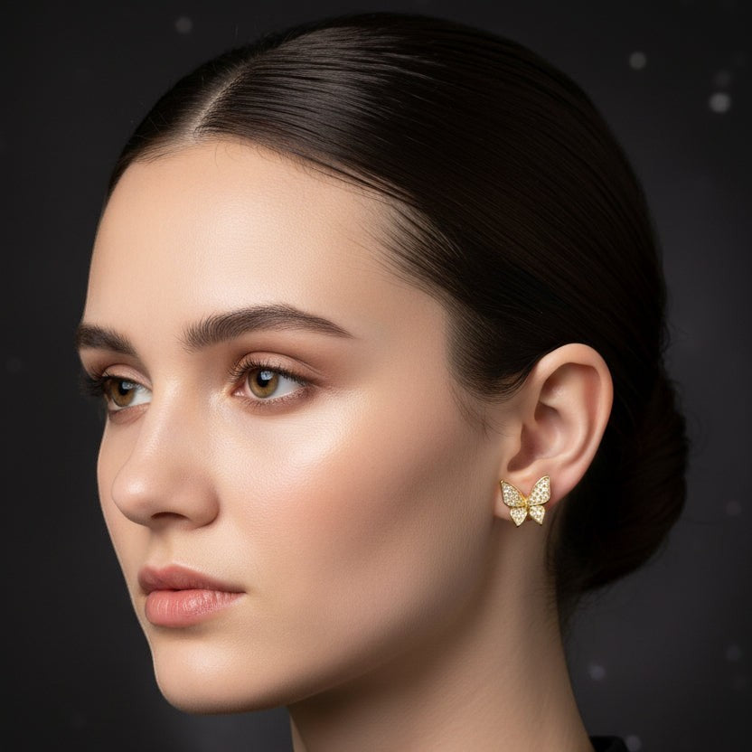 SVORA mini gold tone butterfly stud earrings with cubic zirconia stones