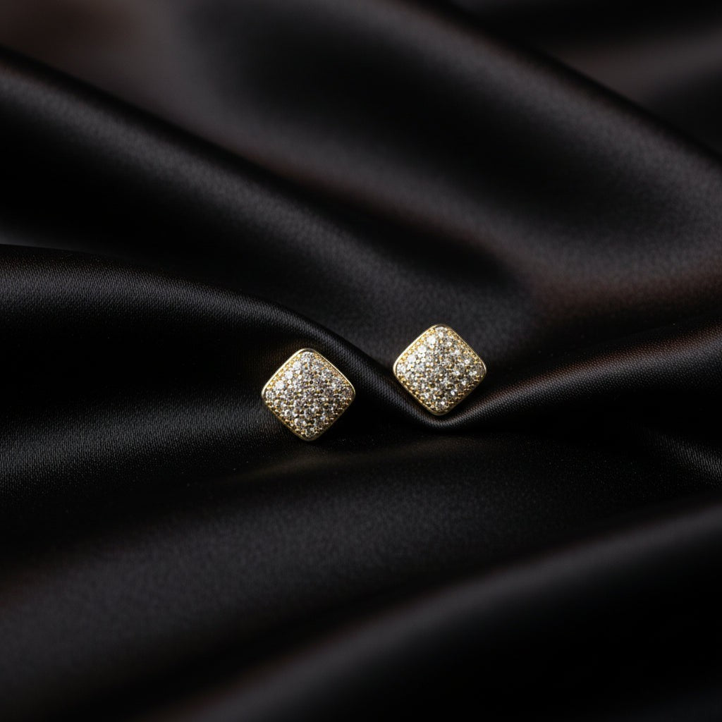 SVORA mini gold tone square stud earrings with pavé cubic zirconia and milgrain border.