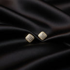 SVORA mini gold tone square stud earrings with pavé cubic zirconia and milgrain border.