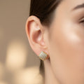 SVORA mini gold tone square stud earrings with pavé cubic zirconia and milgrain border.