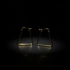 SVORA gold-tone stainless steel minimal triangle hoop earrings with a high-polish finish.