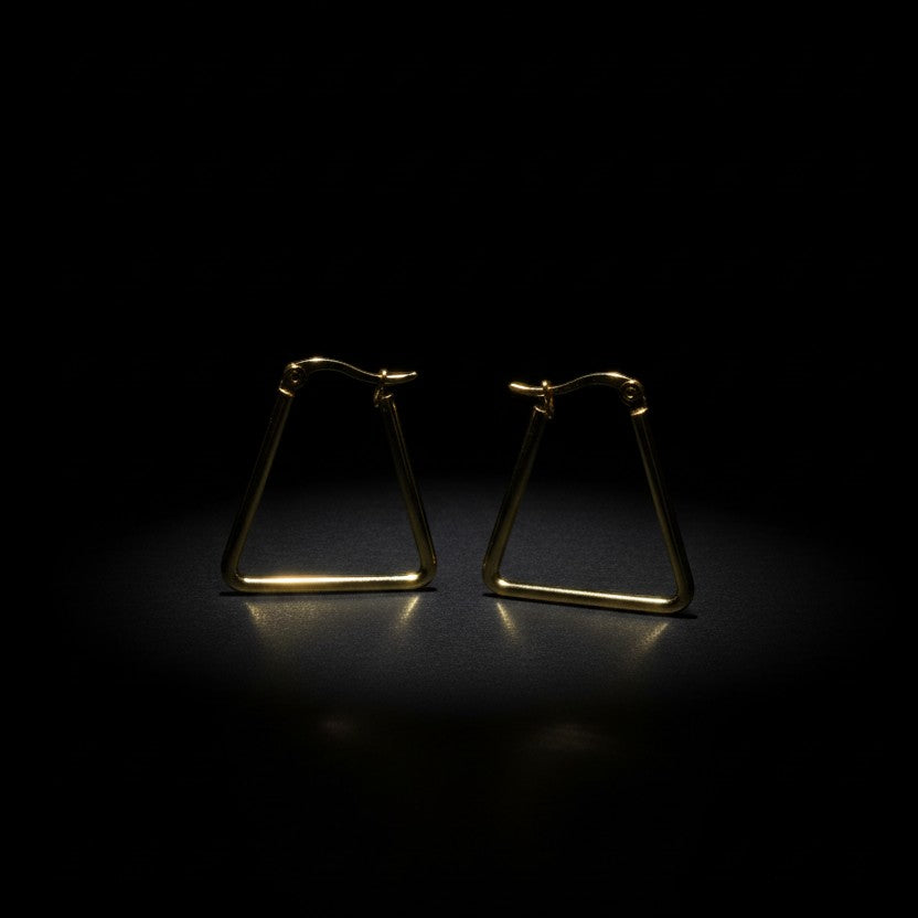 SVORA gold-tone stainless steel minimal triangle hoop earrings with a high-polish finish.